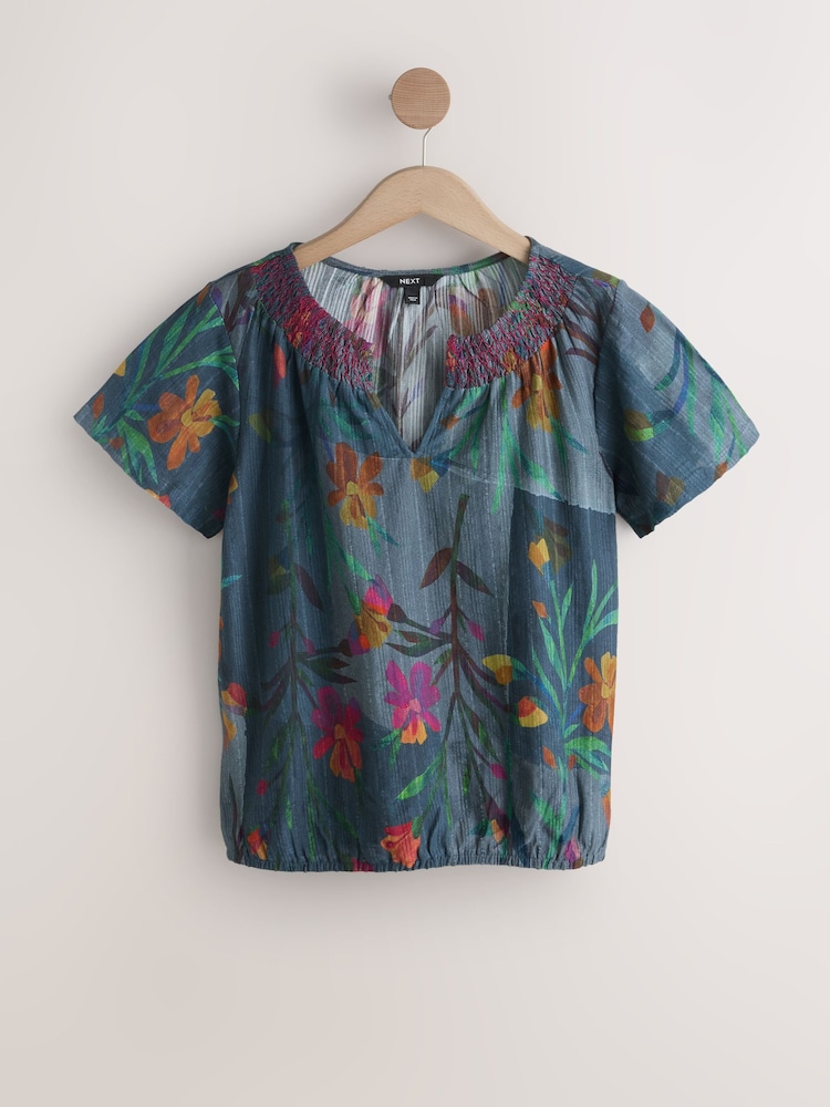 Navy Floral Print Short Sleeve Notch Neck Shirred Bubblehem Top - Image 1 of 3 Navy Floral Print Short Sleeve Notch Neck Shirred Bubblehem Top - Image 1 of 3