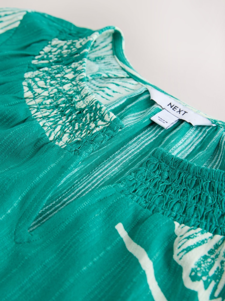 Green Palm Print Short Sleeve Notch Neck Shirred Bubblehem Top - Image 3 of 3