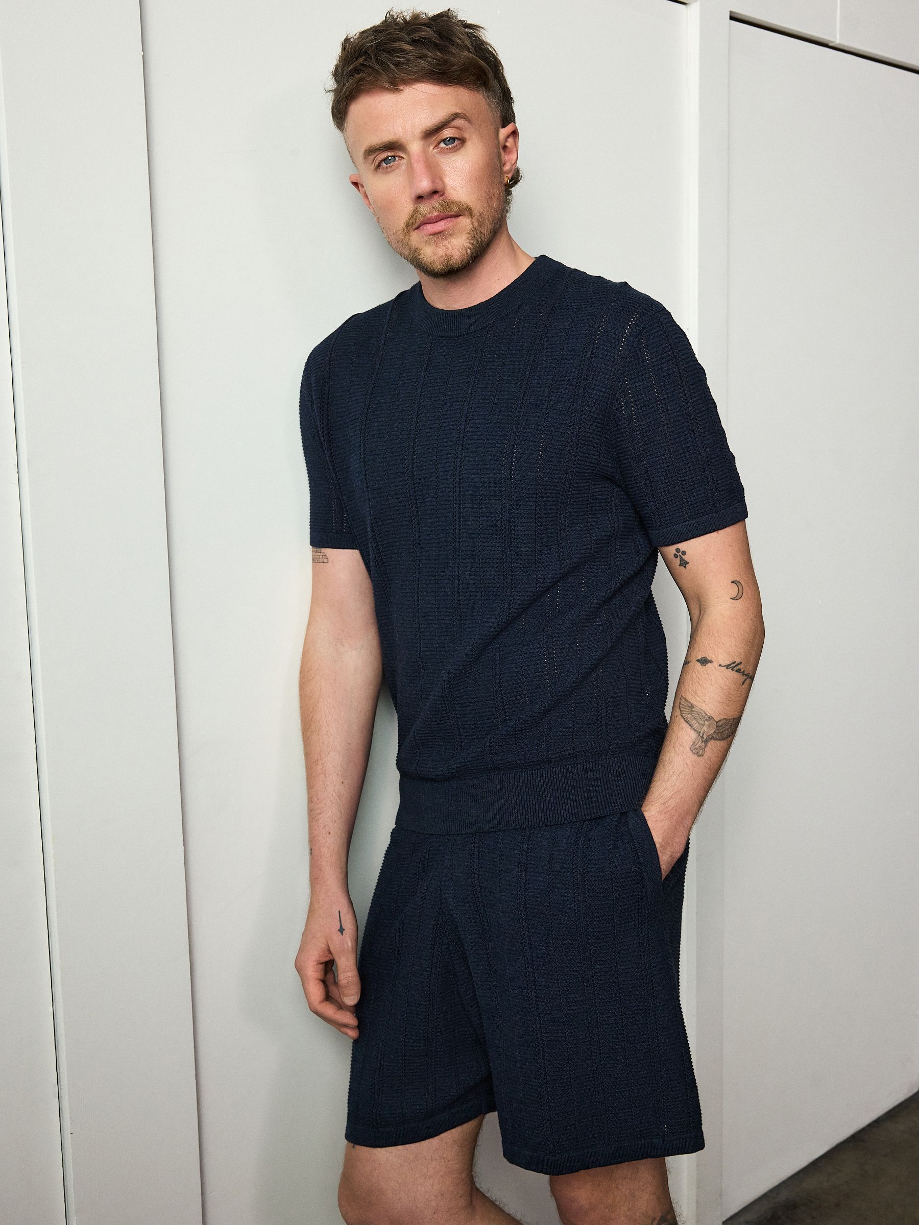 Buy Navy Blue Regular Fit Ribbed Texture Knitted T-Shirt from the