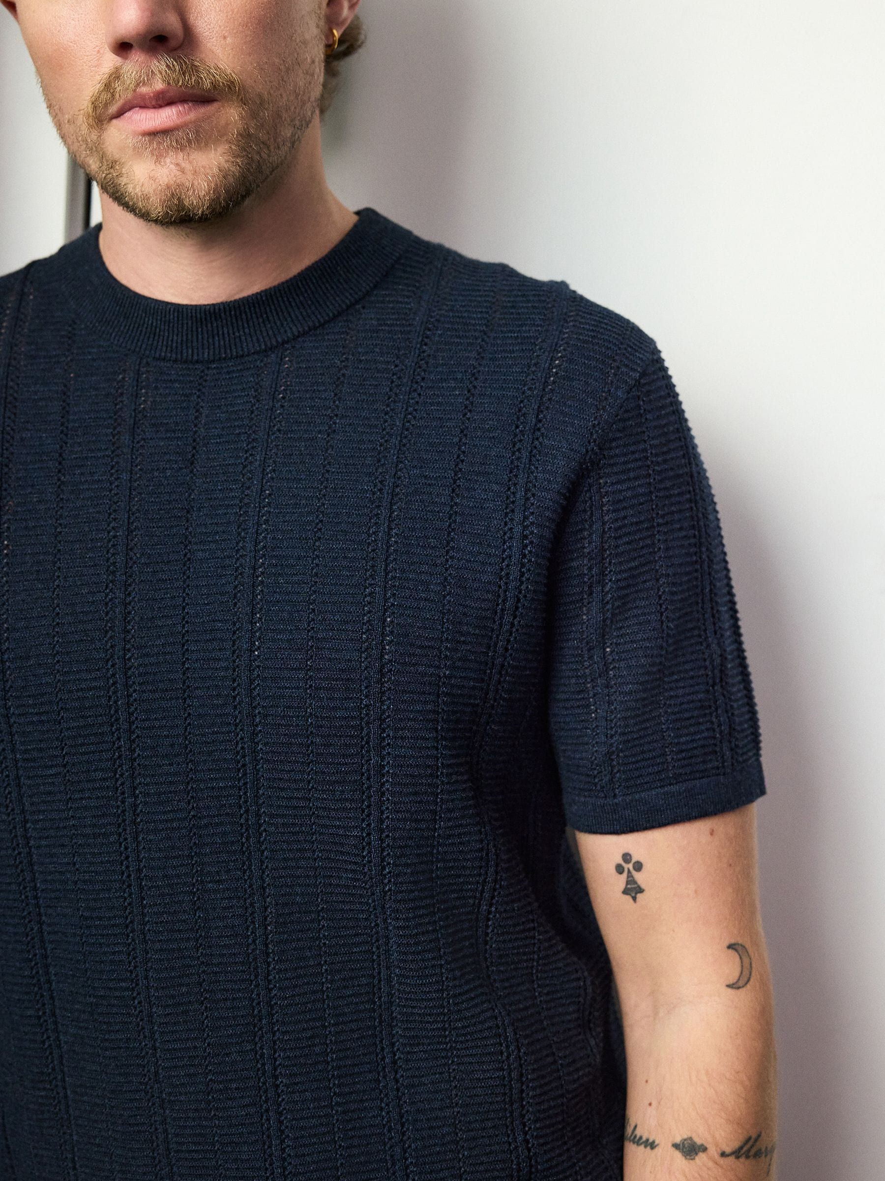 Buy Navy Blue Regular Fit Ribbed Texture Knitted T-Shirt from the