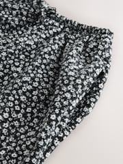 Black/White Flower Print Wide Leg Trousers (3-16yrs) - Image 4 of 4