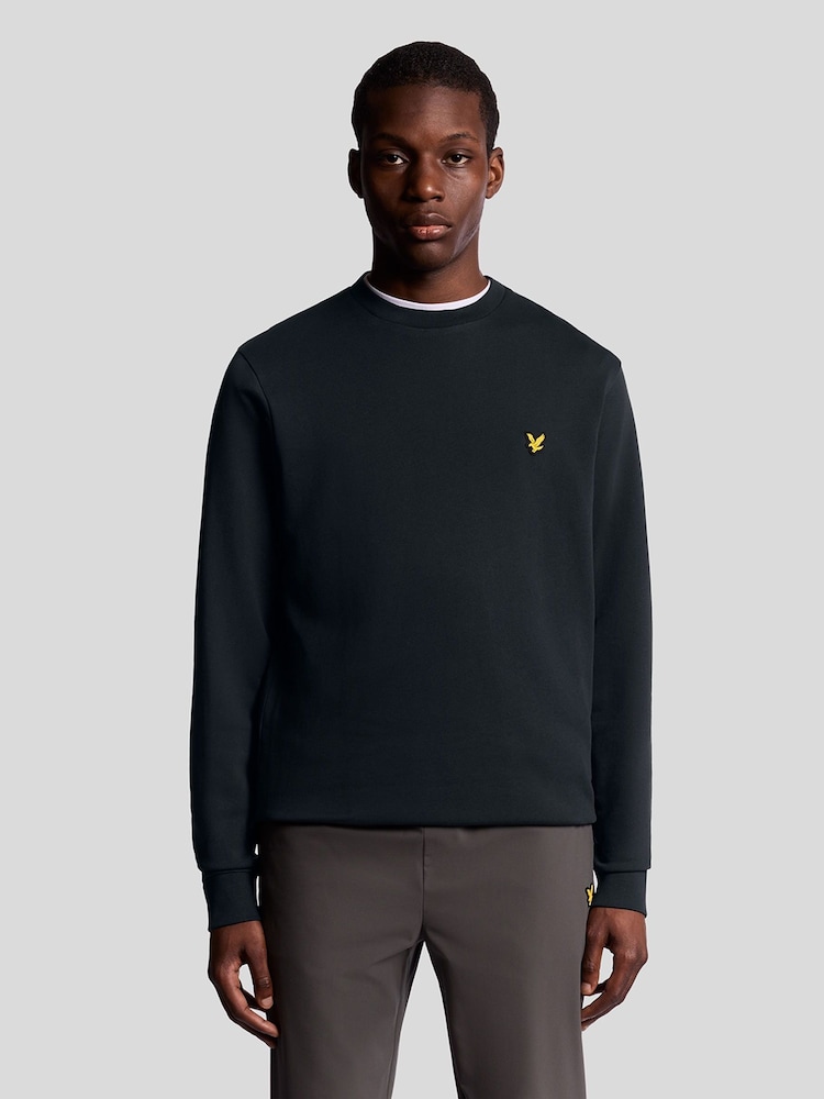 Lyle & Scott Blue Geometric Globe Graphic Print Crew Neck Sweatshirt - Image 1 of 5 Lyle & Scott Blue Geometric Globe Graphic Print Crew Neck Sweatshirt - Image 1 of 5