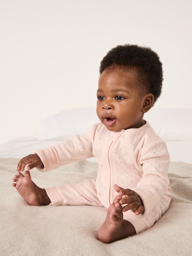 The White Company Pink Pointelle Heart Zip Sleepsuit - Image 1 of 5 The White Company Pink Pointelle Heart Zip Sleepsuit - Image 1 of 5