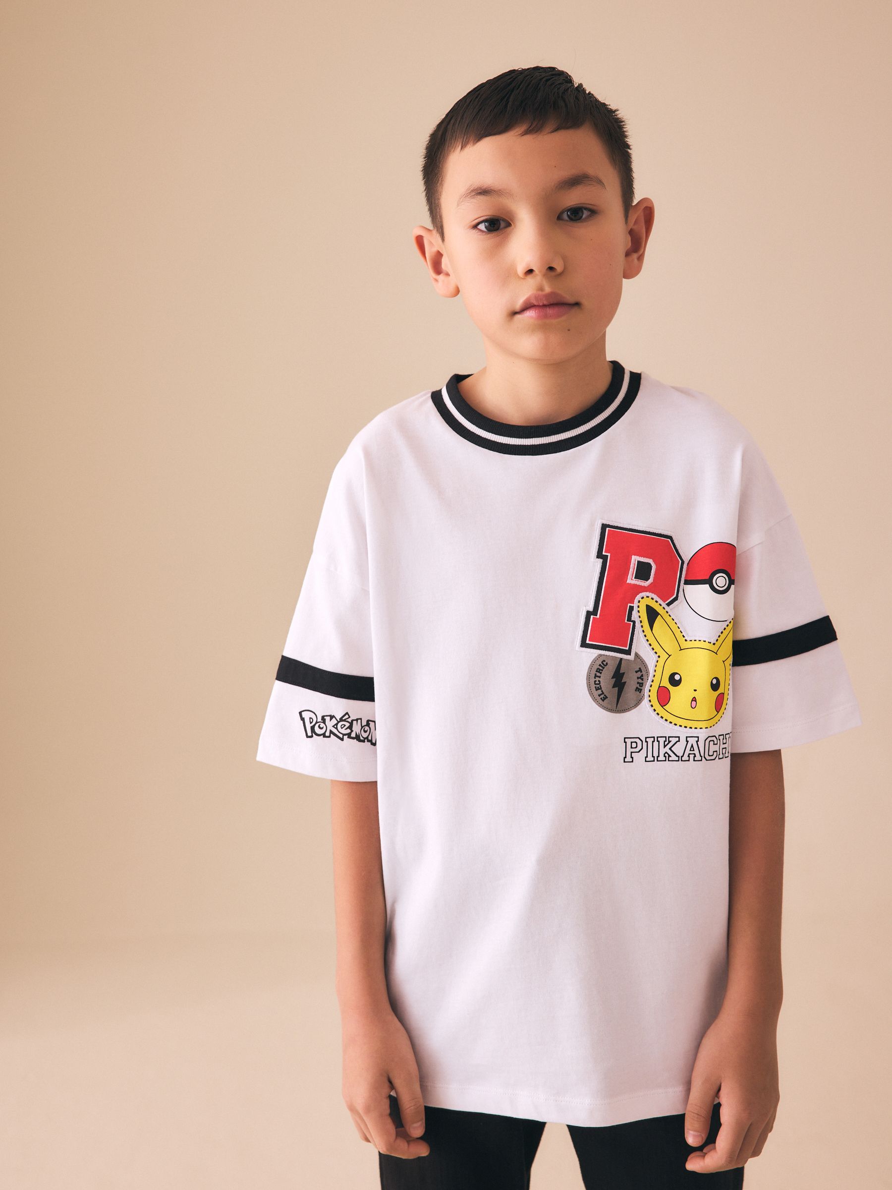 Buy White Varsity Pokémon Short Sleeve T-Shirt (3-16yrs) from Next
