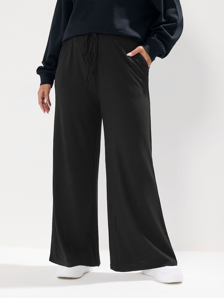 Yours Curve Black Wide Leg Ribbed Pull On Trousers - Image 2 of 5 Yours Curve Black Wide Leg Ribbed Pull On Trousers - Image 2 of 5