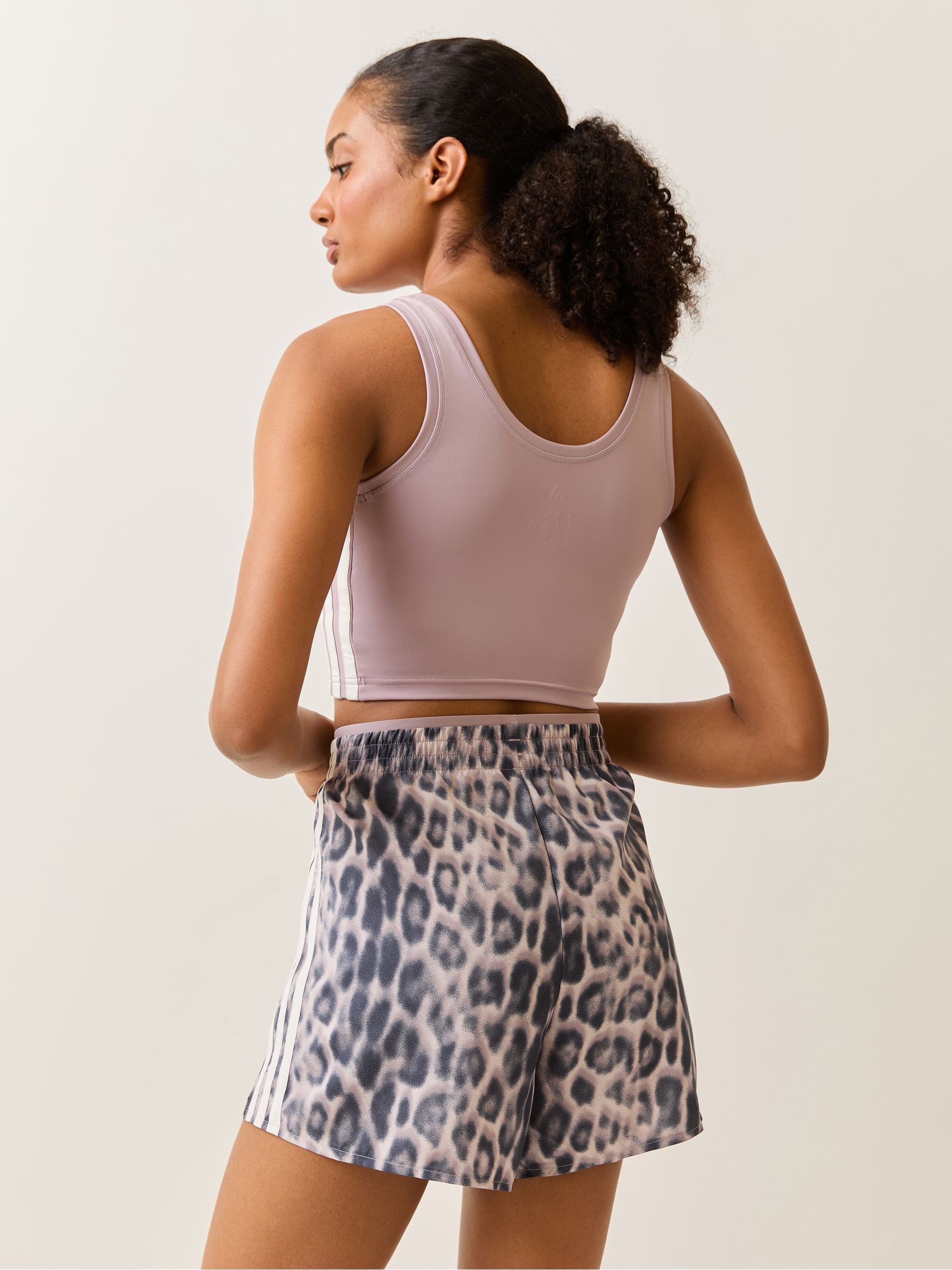 Buy adidas Purple Workout Essentials Leopard Woven Shorts from the