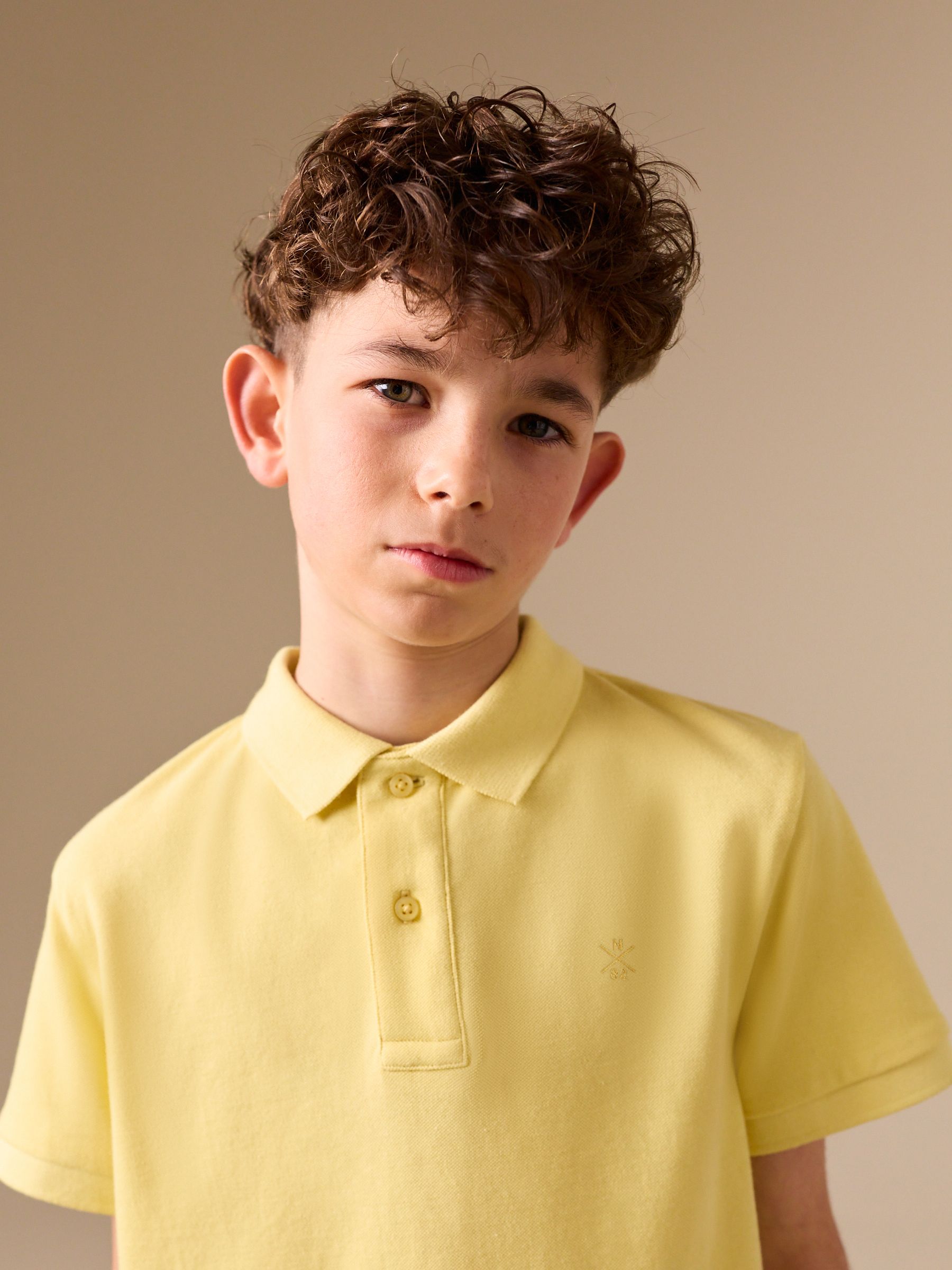 Buy Yellow Sign Off Short Sleeve Polo Shirt (3-16yrs) from Next Germany