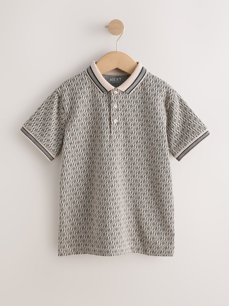 Neutral/Black Short Sleeve Jersey Polo Shirt (3-16yrs) - Image 1 of 4 Neutral/Black Short Sleeve Jersey Polo Shirt (3-16yrs) - Image 1 of 4