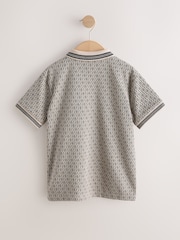 Neutral/Schwarz - Kurzarm-Poloshirt aus Jersey (3-16Jahre) - Bild 6 von 8