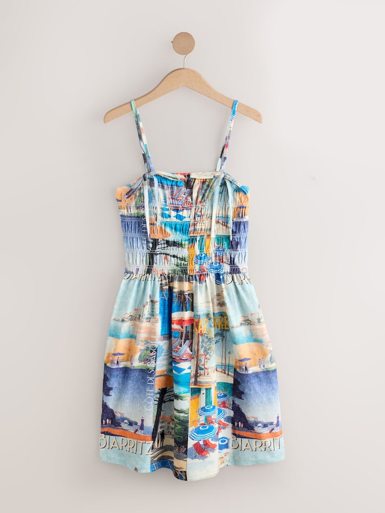 أزرق طباعة - فستان قصير بحمَّالات برقبة مربعة وجزء عُلوي مُجمّع - صورة 1 من 3