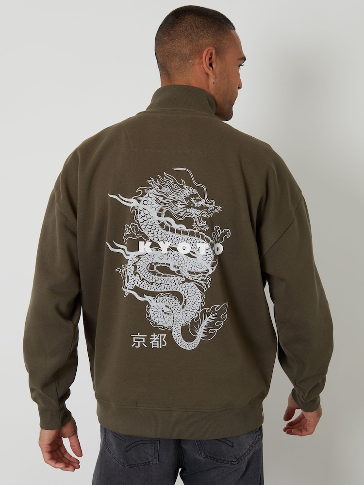 Threadbare Green Relaxed Fit Graphic Print Quarter Zip Sweatshirt - Image 1 of 4 Threadbare Green Relaxed Fit Graphic Print Quarter Zip Sweatshirt - Image 1 of 4