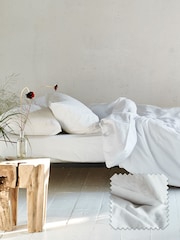 Designers Guild Coral Pink Loweswater 300 Thread Count Duvet Cover and Pillowcase Set - Image 1 of 3