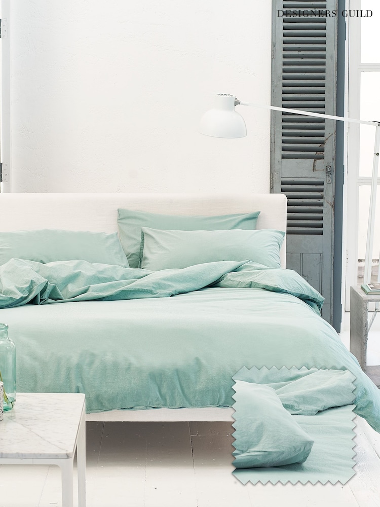 Designers Guild Porcelain Green Loweswater 300 Thread Count Duvet Cover and Pillowcase Set - Image 1 of 3 Designers Guild Porcelain Green Loweswater 300 Thread Count Duvet Cover and Pillowcase Set - Image 1 of 3