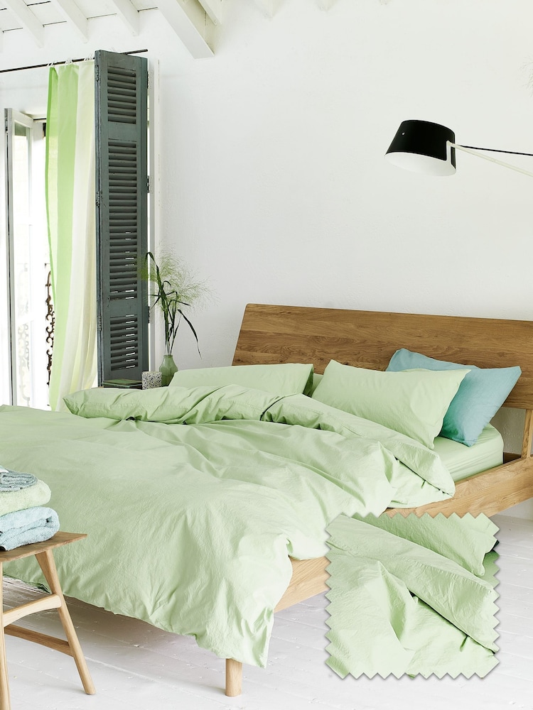 Designers Guild Willow Green Loweswater 300 Thread Count Duvet Cover and Pillowcase Set - Image 1 of 4 Designers Guild Willow Green Loweswater 300 Thread Count Duvet Cover and Pillowcase Set - Image 1 of 4