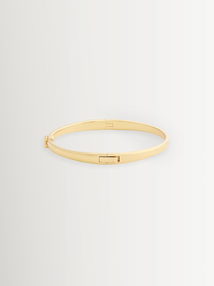 Buy COACH Gold Tone Signature C Bangle Boxed Bracelet from  display picture 3