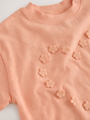 Orange/Apricot - Kurzarm-T-Shirt mit Blumenapplikation (3M.–7J.) - Bild 7 von 7