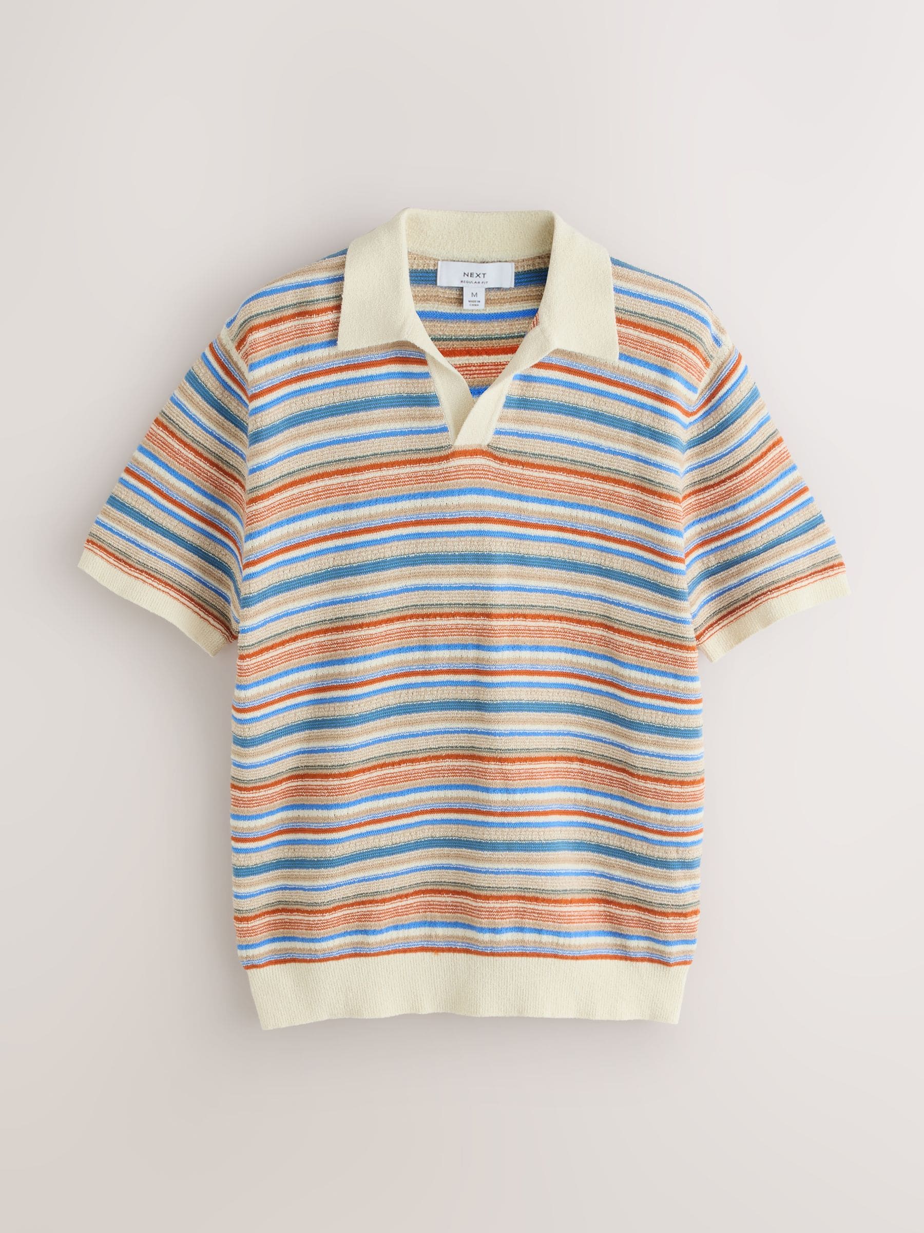 Buy White/Multi Boucle Stripe Knit Trophy Polo Shirt from the Next