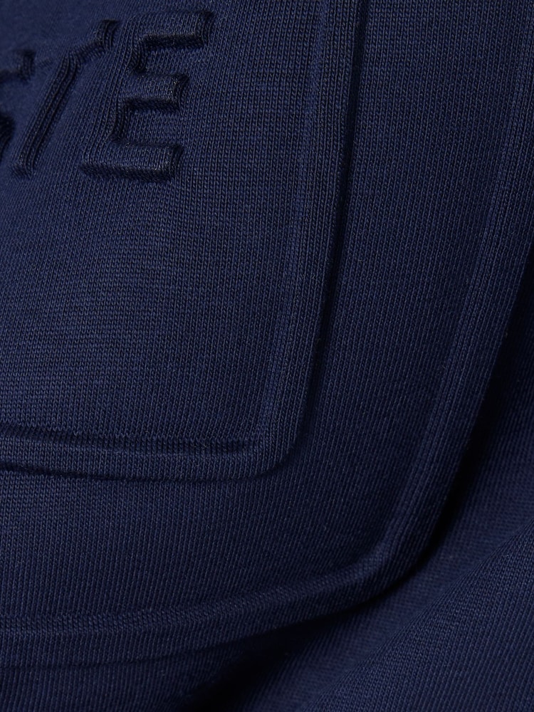 Lacoste Blue Classic Fit Embossed Cotton T-Shirt - Image 9 of 9 Lacoste Blue Classic Fit Embossed Cotton T-Shirt - Image 9 of 9