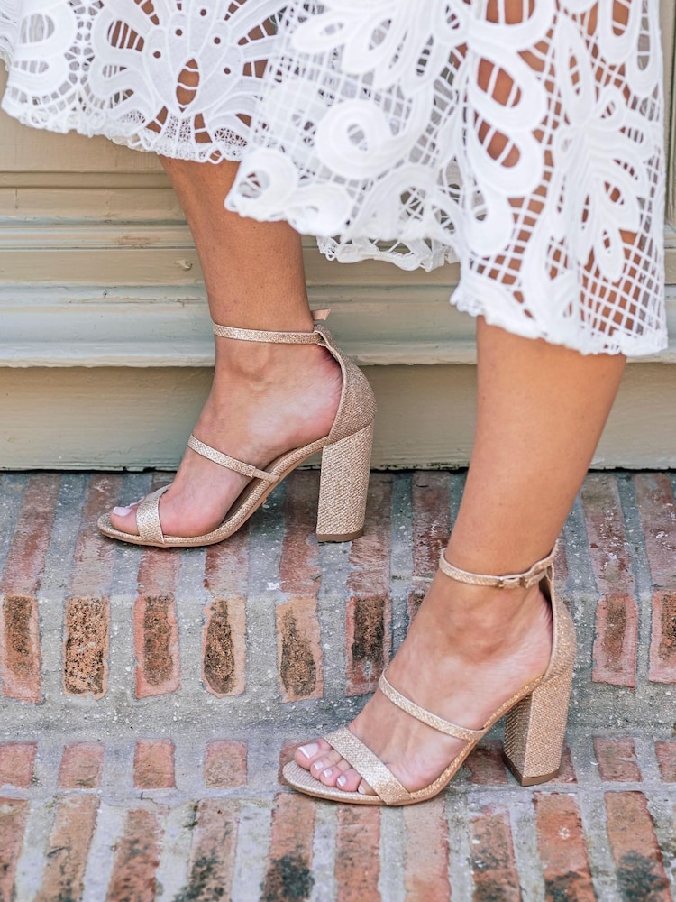 Novo Gold Regular Fit Penguin Double Strap Gliiter Heeled Sandal - Image 1 of 3 Novo Gold Regular Fit Penguin Double Strap Gliiter Heeled Sandal - Image 1 of 3