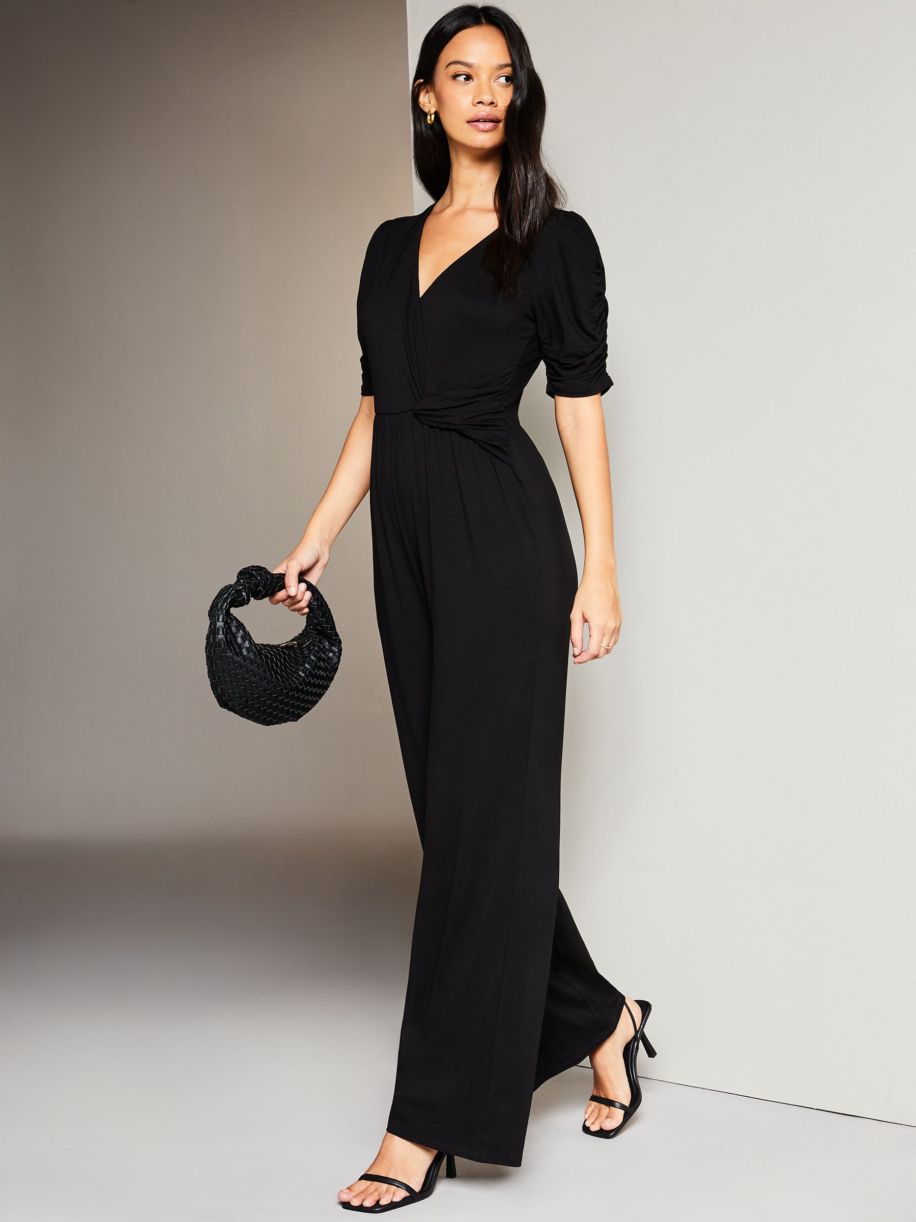 Buy Lipsy Black Petite Short Sleeve Twist Front Jersey Wide Leg Jumpsuit from Next Luxembourg