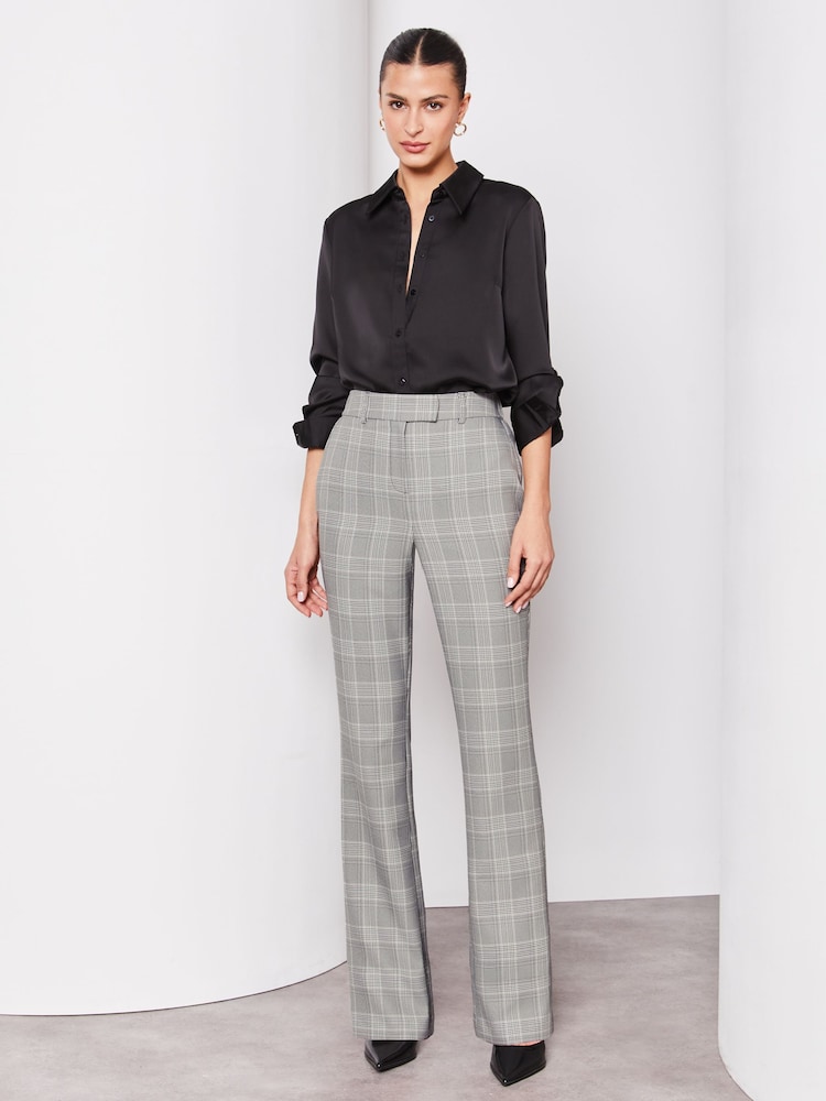 Lipsy Black Grey Check Smart Bootleg Kick Flare Trousers - Image 1 of 4 Lipsy Black Grey Check Smart Bootleg Kick Flare Trousers - Image 1 of 4