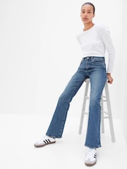 Gap – Hoch taillierte Stretch-Schlagjeans im 70er Stil - Bild 1 von 5