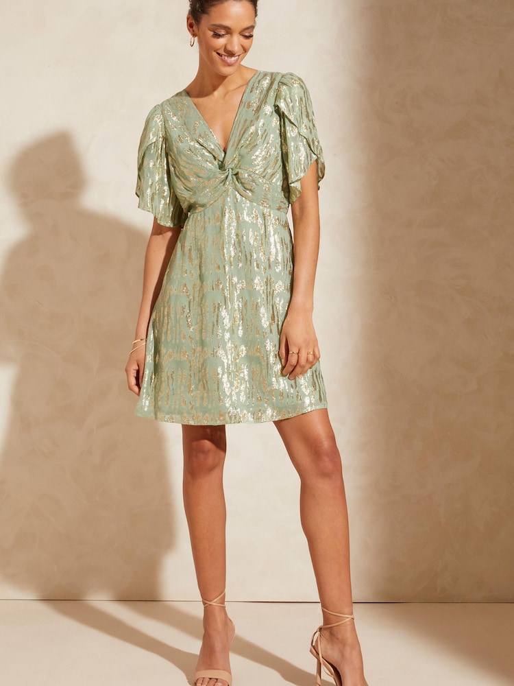 Love & Roses Sage Green Metallic Twist Front Flutter Sleeve Mini Dress - Image 4 of 4 Love & Roses Sage Green Metallic Twist Front Flutter Sleeve Mini Dress - Image 4 of 4