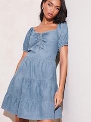 Lipsy Blue Chambray Ruched Sweatheart Puff Sleeve Tiered Mini Dress - Image 1 of 4