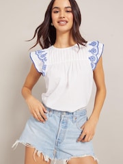 Friends Like These Blue Ruffle Sleeveless Broderie Round Neck Top - Image 1 of 4