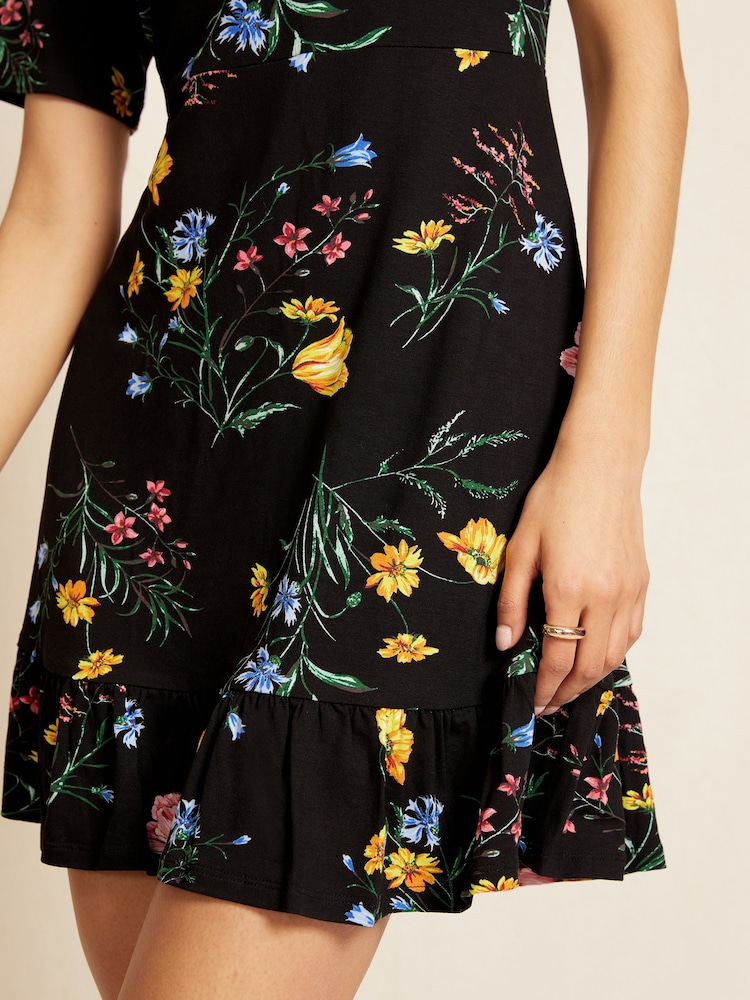 Friends Like These Black Floral Print Short Sleeve Ruffle Hem Jersey Mini Dress - Image 4 of 4