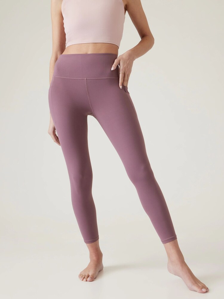 Athleta Purple Salutation Stash 7/8 Leggings - Image 1 of 6 Athleta Purple Salutation Stash 7/8 Leggings - Image 1 of 6