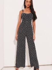 Lipsy Black/White Polka Dot Strappy Corset Wide Leg Jumpsuit - Image 1 of 4