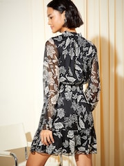 Friends Like These Black/Neutral Chiffon Tie Neck Ruffle Hem Mini Dress - Image 4 of 4