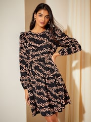 Friends Like These Black Ruffle Sleeve Mini Fit and Flare Dress - Image 1 of 4