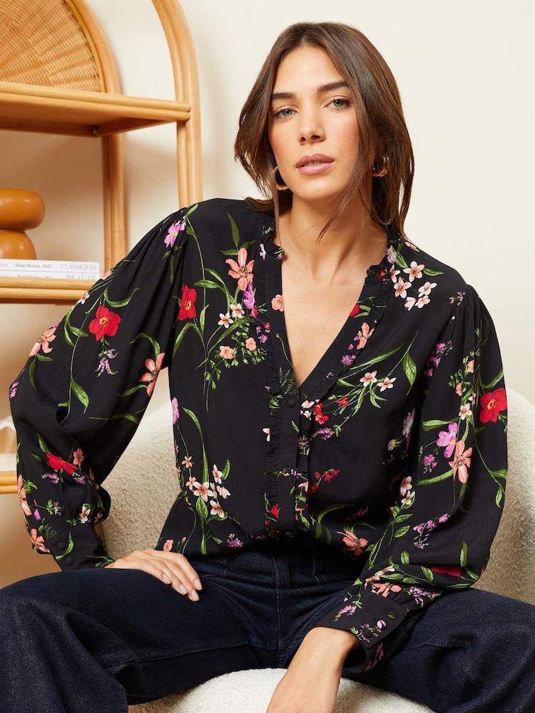 Love & Roses Black and White Floral Ruffle Trim V Neck Long Sleeve Blouse - Image 1 of 4