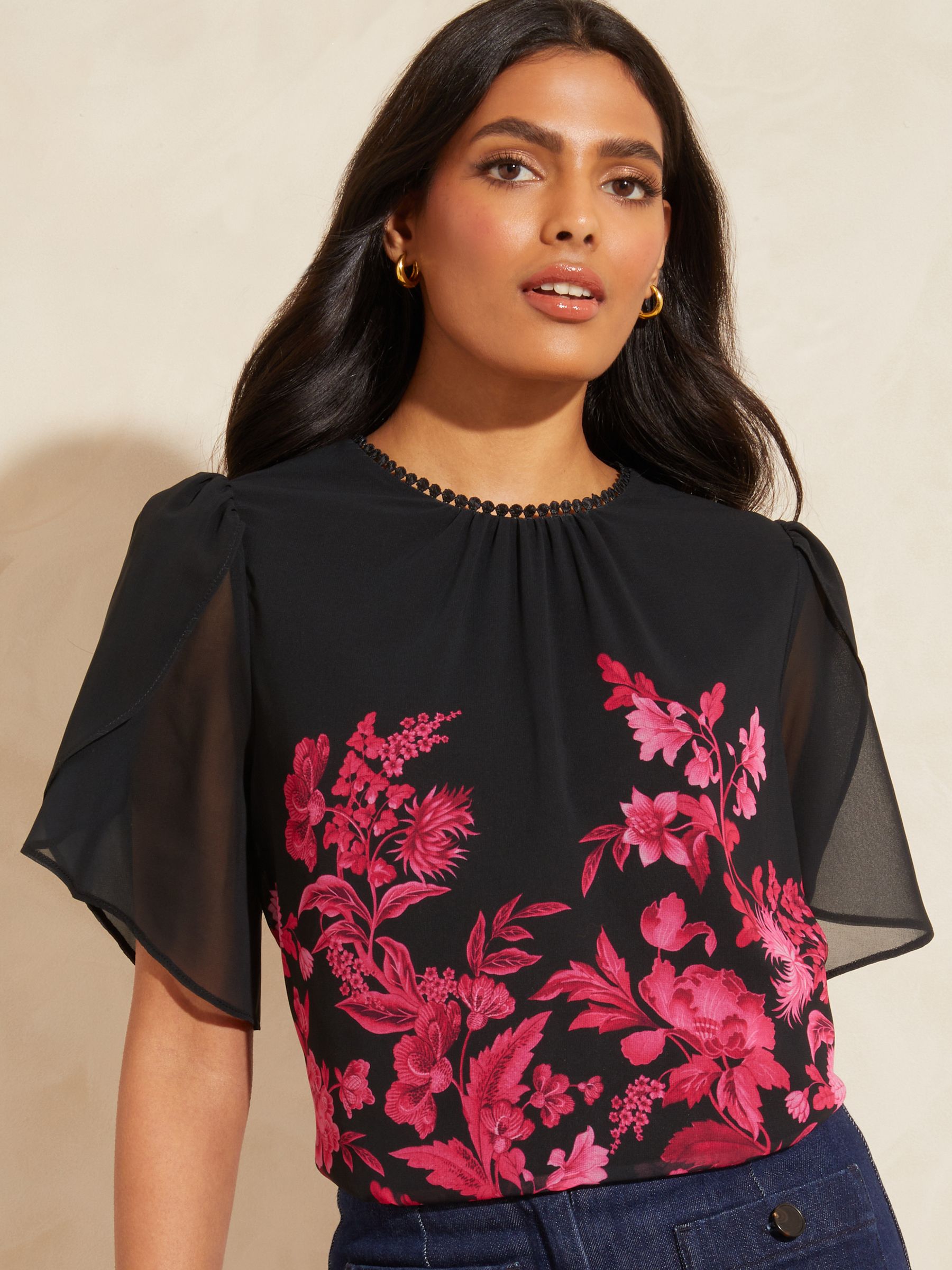 Black sheer top with roses 2025