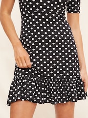 Friends Like These Black Spot Print Short Sleeve Ruffle Hem Jersey Mini Dress - Image 4 of 4