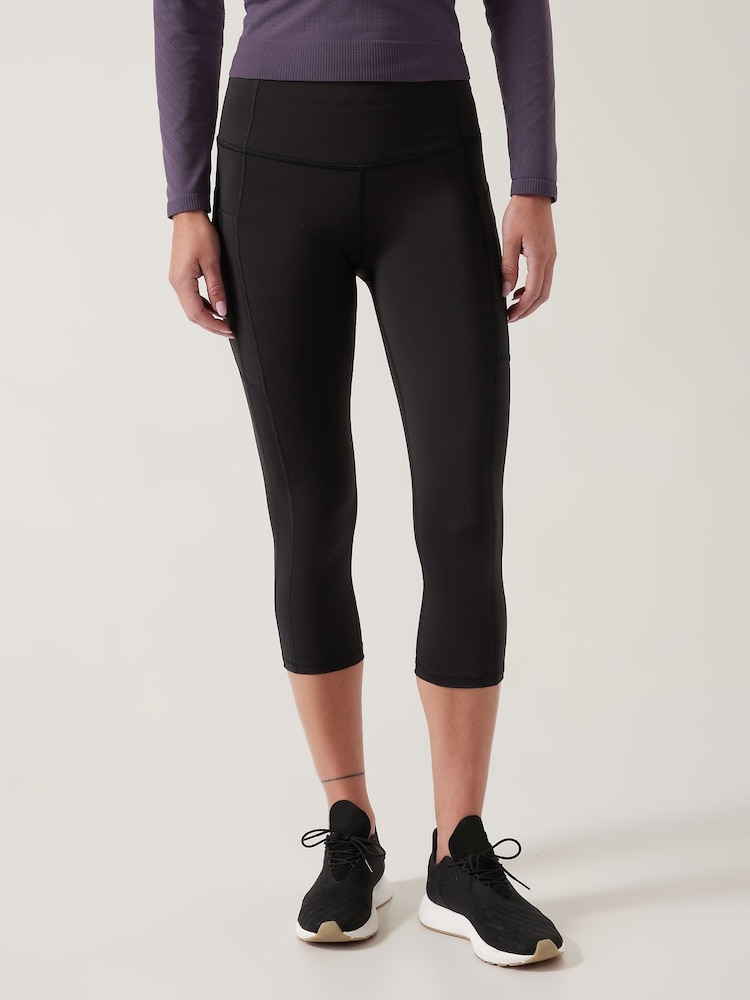 Athleta Black 3/4 Length Saluation High Waisted Pocket Leggings - Image 1 of 6