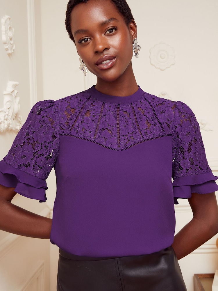Love & Roses Purple Lace Mix Yoke High Neck Ruffle Sleeve Top - Image 1 of 4