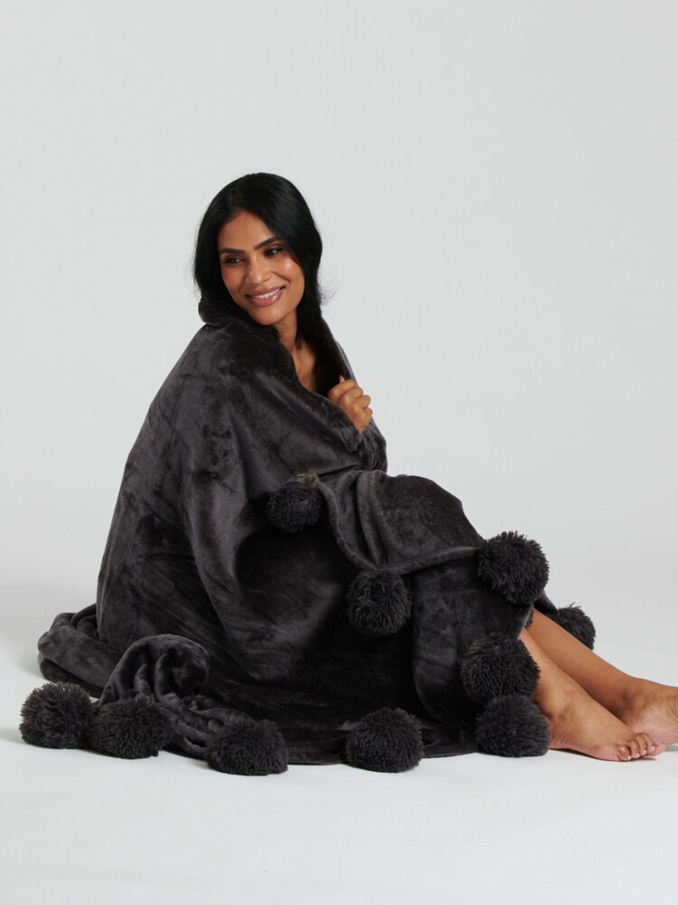 Loungeable Black Pom Pom Flannel Fleece Blanket - Image 1 of 3
