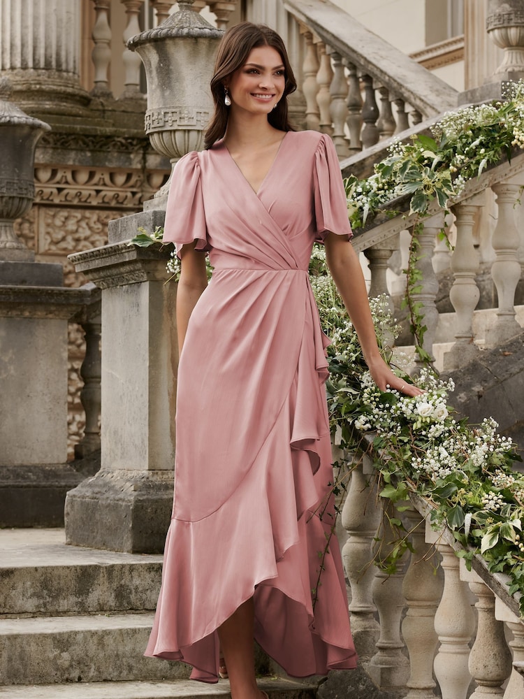 Lipsy Pink Petite Flutter Sleeve Wrap Front Bridesmaid Maxi Dress - Image 1 of 4 Lipsy Pink Petite Flutter Sleeve Wrap Front Bridesmaid Maxi Dress - Image 1 of 4