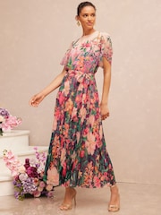 V&A | Love & Roses Pink Floral Petite Placement Printed Tulip Sleeve Belted Pleated Midi Dress - Image 1 of 5