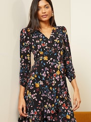 Love & Roses Black Floral Jersey 3/4 Puff Sleeve Wrap Mini Dress - Image 1 of 4