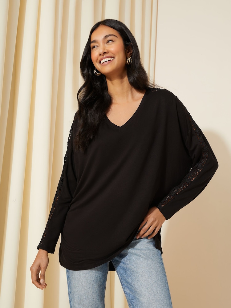 Friends Like These Black Crochet Soft Jersey V Neck Long Sleeve Tunic Top - Image 1 of 4