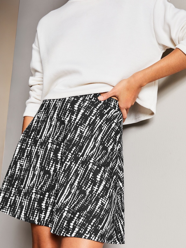Lipsy Black Marker Print Flippy Mini Skater Skirt - Image 4 of 4