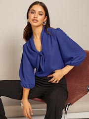 Friends Like These Blue Petite V Neck Bow Front 3/4 Sleeve Blouse - Image 1 of 4