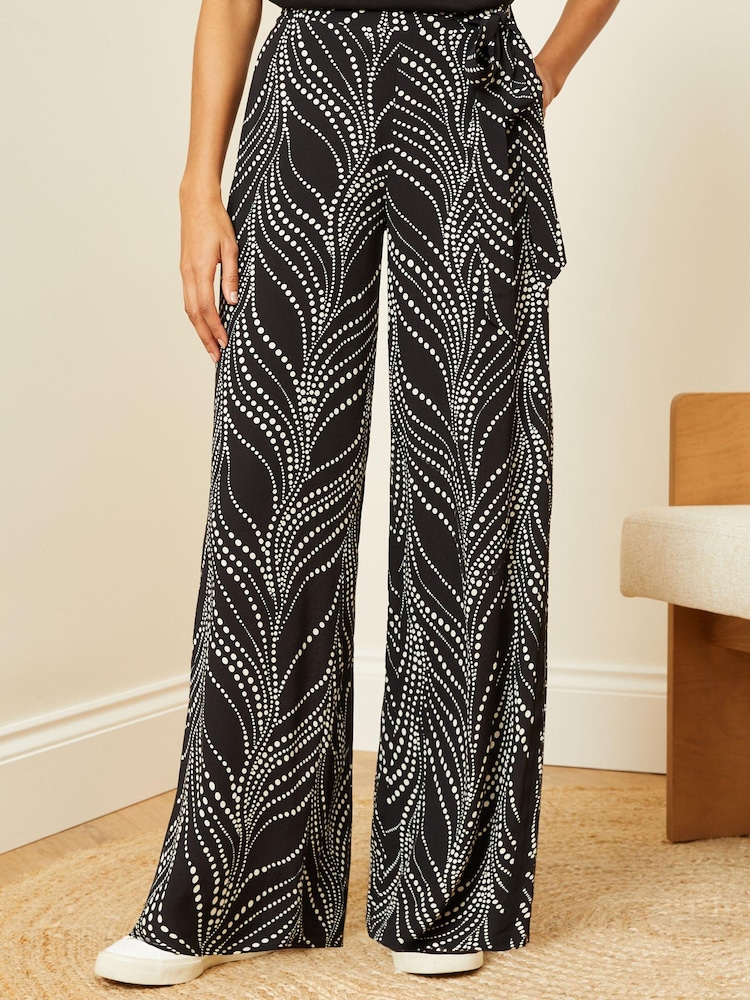 Love & Roses Black and White Polka Dot Printed Belted Wide Leg Trousers - Image 1 of 1