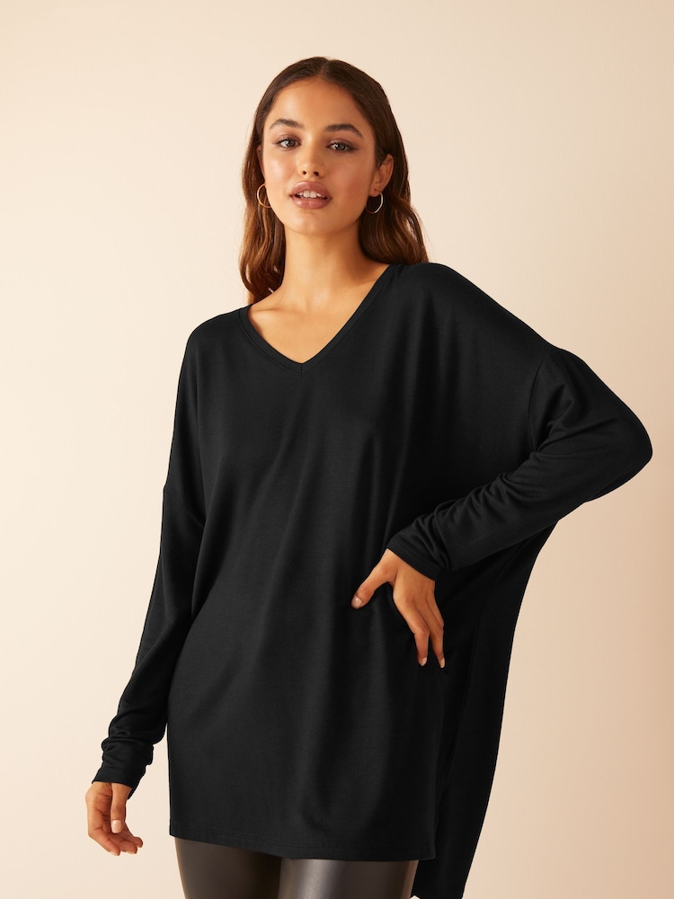 Friends Like These Black Petite Short Sleeve V Neck Tunic Top - Image 1 of 4