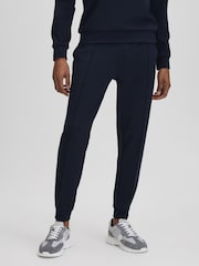 Reiss Midnight Navy Carter Castore Jersey Tapered Joggers - Image 1 of 6