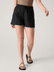 Athleta Black Retreat 100% Linen Mid Rise Shorts - Image 1 of 6
